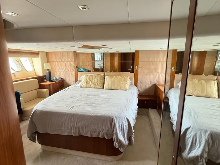  Yacht Photos Pics Luxurious bedroom interior of 2008 Sunseeker Manhattan 60 yacht with elegant furnishings.