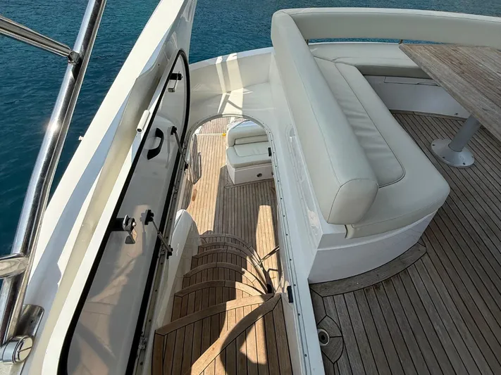  Yacht Photos Pics Luxurious 2008 Sunseeker Manhattan 60 yacht interior with elegant seating and wooden flooring.