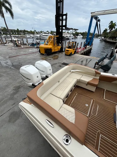  Yacht Photos Pics 2013 Statement 35 Center Console boat with Mercury engines at a marina dock.