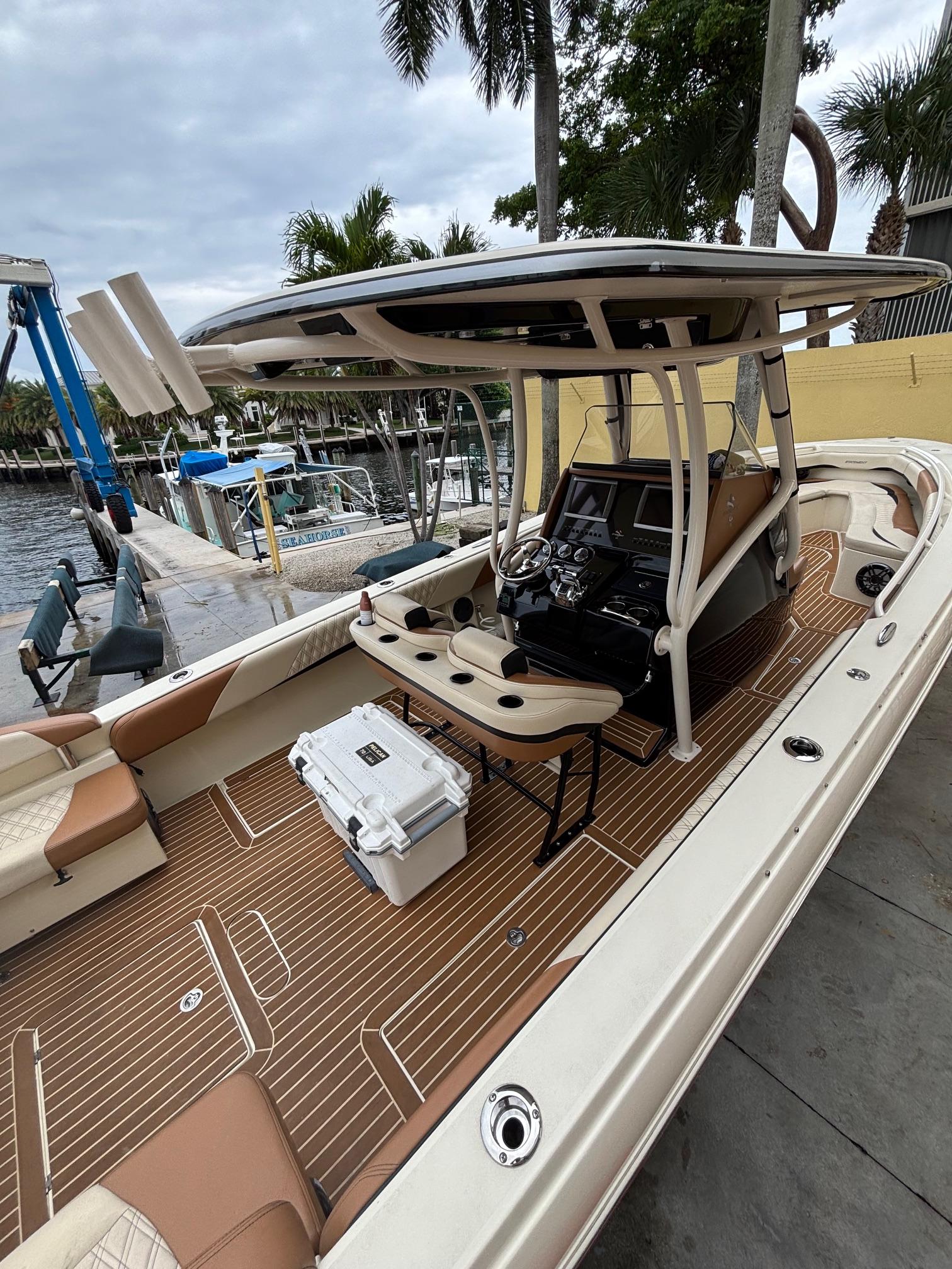 2013 Statement 35 Center Console boat with sleek design and spacious deck.