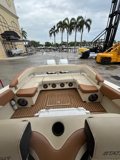  Yacht Photos Pics Luxurious 2013 Statement 35 Center Console boat interior with plush seating and teak flooring.