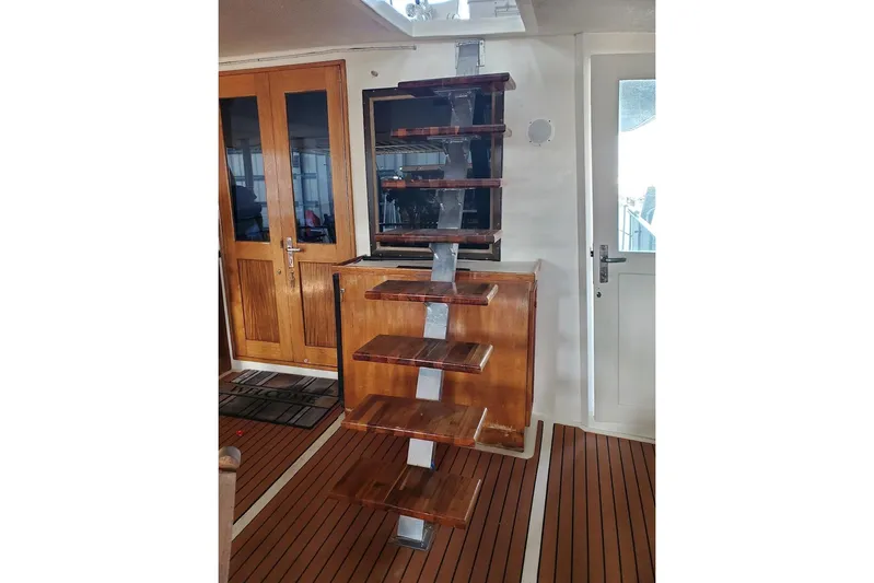  Yacht Photos Pics Interior of 1984 Hatteras 61 Cockpit MY with wooden stairs and doors.