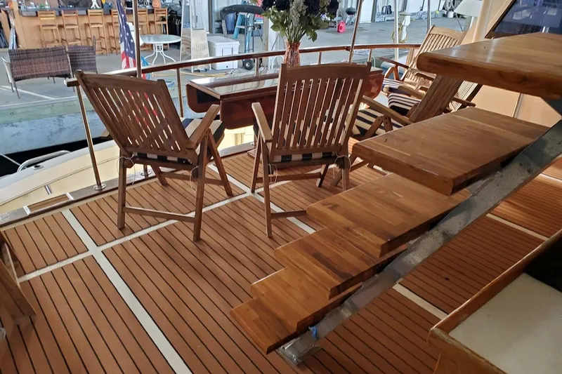  Yacht Photos Pics 1984 Hatteras 61 Cockpit MY yacht with wooden deck and seating area.
