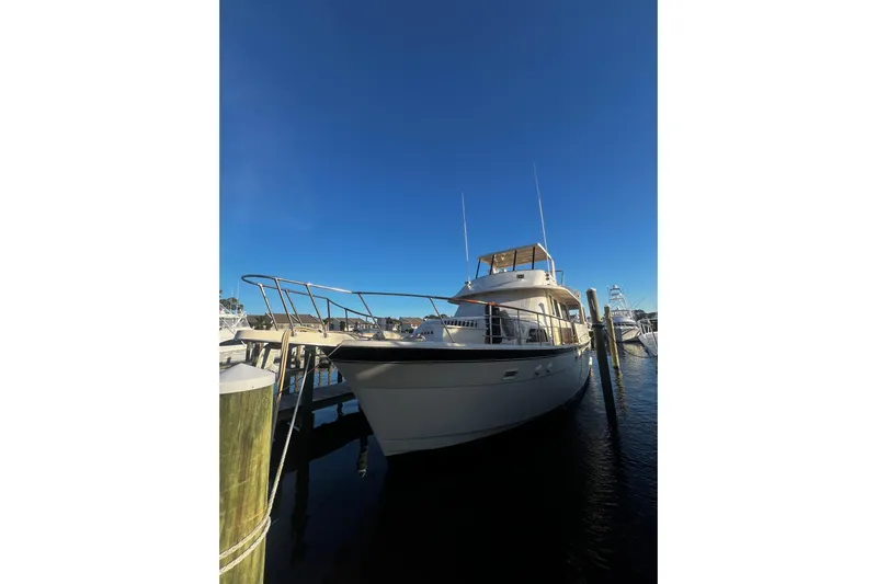  Yacht Photos Pics 1984 Hatteras 61 Cockpit MY yacht docked under clear blue sky.