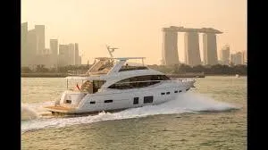  Yacht Photos Pics Luxury Princess 75 yacht cruising near city skyline at sunset, 2018 model.