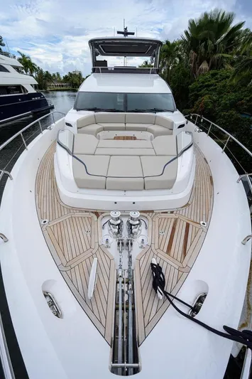Escape Yacht Photos Pics 2022 Princess Y85 Motor Yacht with spacious deck and luxurious seating.