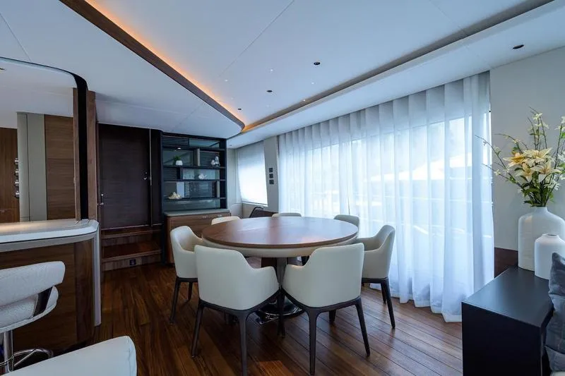 Escape Yacht Photos Pics Luxurious interior of 2022 Princess Y85 Motor Yacht with elegant dining area.