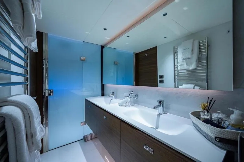 Escape Yacht Photos Pics Luxurious bathroom on 2022 Princess Y85 Motor Yacht with dual sinks and modern design.