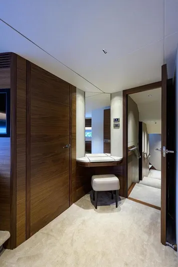 Escape Yacht Photos Pics Luxurious interior of 2022 Princess Y85 Motor Yacht with modern wood finishes.