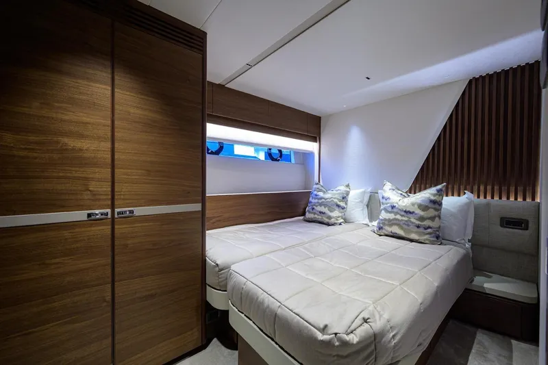Escape Yacht Photos Pics Luxurious bedroom interior of 2022 Princess Y85 Motor Yacht with modern design.