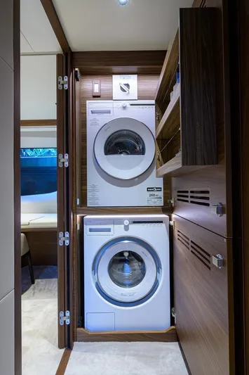 Escape Yacht Photos Pics Laundry area with washer and dryer on 2022 Princess Y85 Motor Yacht.
