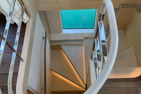  Yacht Photos Pics Staircase inside 2018 Princess 75 yacht with modern design and elegant lighting.