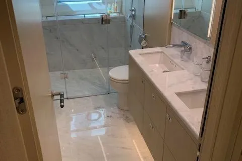  Yacht Photos Pics Luxurious bathroom in 2018 Princess 75 yacht with marble flooring and modern fixtures.