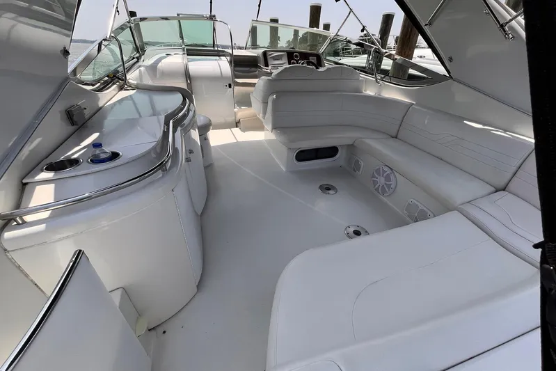 La Bella Vita Yacht Photos Pics 2003 Formula 400 Super Sport boat interior with white seating and sleek design.