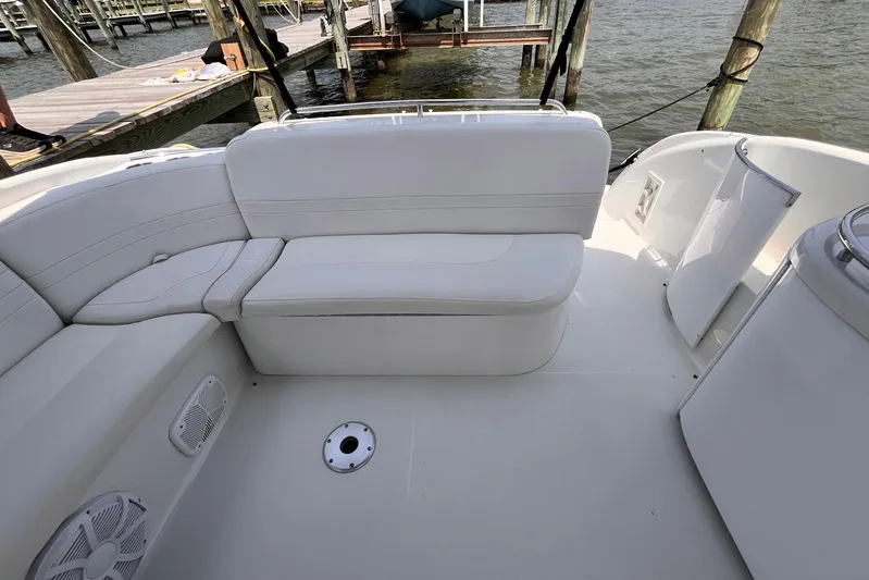 La Bella Vita Yacht Photos Pics 2003 Formula 400 Super Sport boat interior with white seating and dock view.