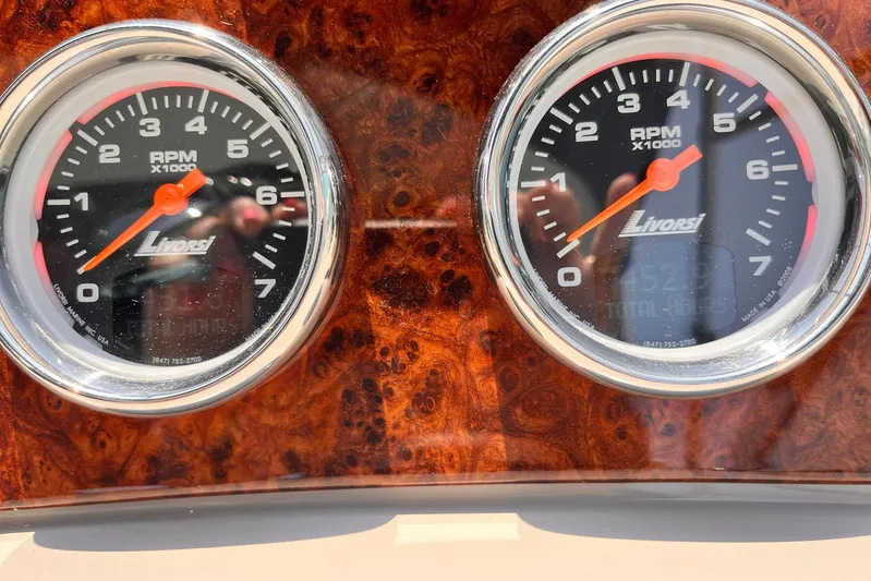 La Bella Vita Yacht Photos Pics Close-up of Livorsi RPM gauges on 2003 Formula 400 Super Sport dashboard.