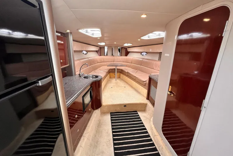 La Bella Vita Yacht Photos Pics Luxurious interior of a 2003 Formula 400 Super Sport yacht with modern amenities.