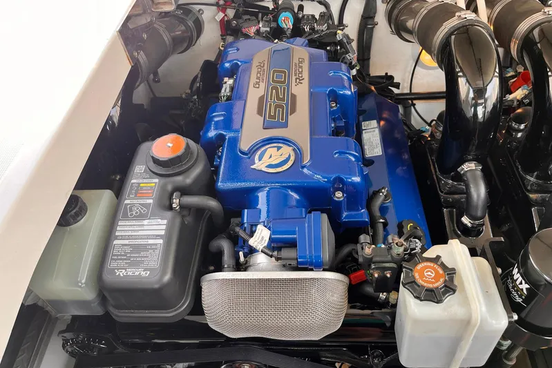 La Bella Vita Yacht Photos Pics 2003 Formula 400 Super Sport engine, featuring a powerful blue 520 horsepower motor.
