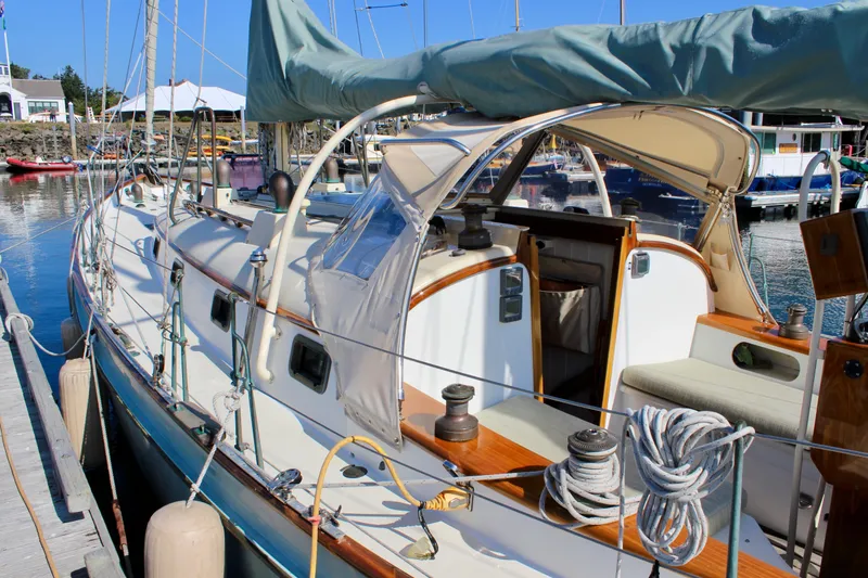 La Vie En Rose Yacht Photos Pics Sailboat docked at marina, Custom Gartside Jespersen 40, 2012 model, with blue sail cover.