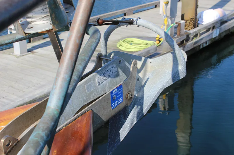 La Vie En Rose Yacht Photos Pics Bow of Custom Gartside Jespersen 40 yacht, 2012, with anchor and dock in background.