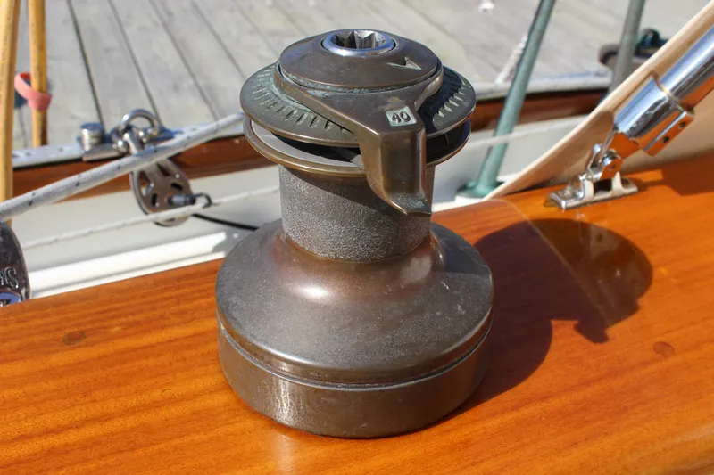 La Vie En Rose Yacht Photos Pics Sailboat winch on Custom Gartside Jespersen 40, 2012 model, mounted on polished wooden deck.
