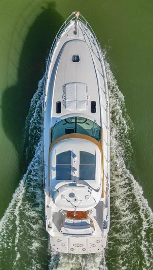  Yacht Photos Pics Top view of a 2006 Sea Ray 60 Sundancer yacht cruising on water.