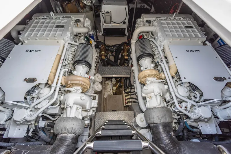  Yacht Photos Pics Engine room of a 2006 Sea Ray 60 Sundancer yacht, showcasing dual engines.
