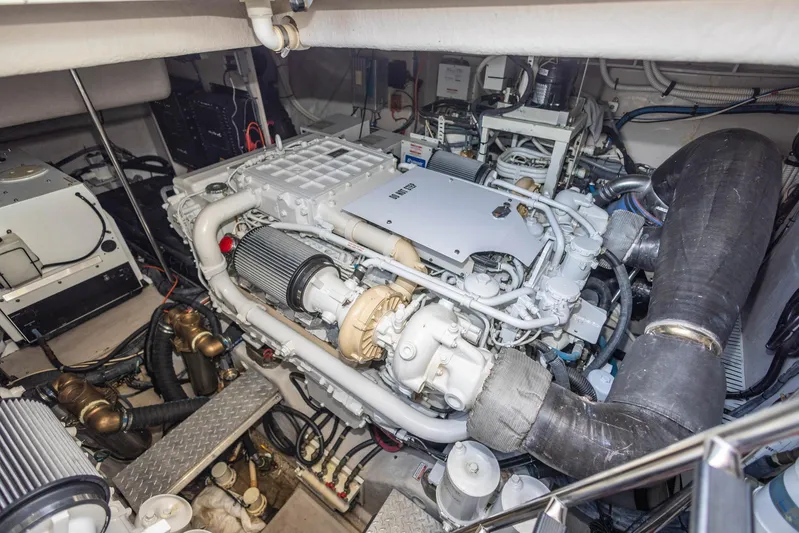  Yacht Photos Pics Engine room of 2006 Sea Ray 60 Sundancer yacht, showcasing complex machinery and components.