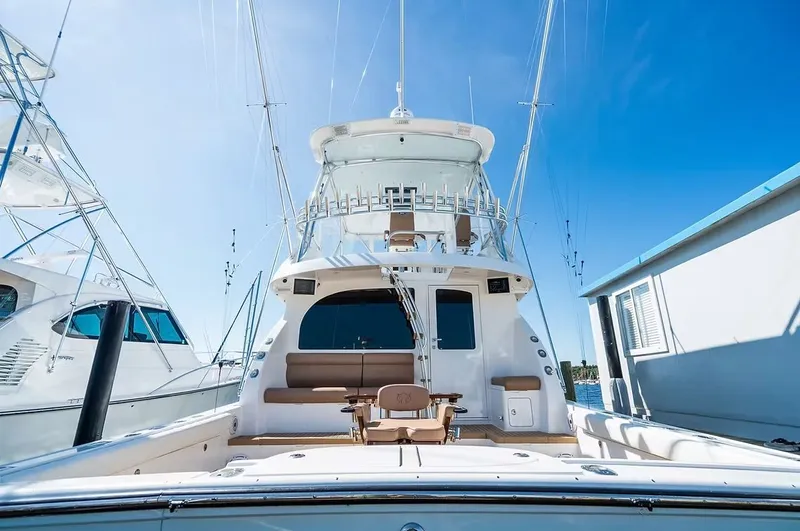 Kelly Lynn Yacht Photos Pics Henriques 50 Sportfisherman 2020 docked, blue sky.