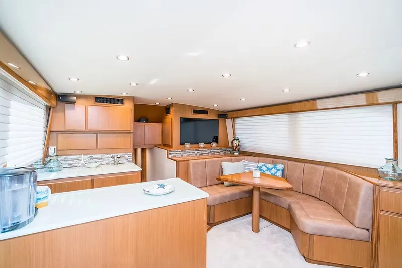 Kelly Lynn Yacht Photos Pics Interior of 2020 Henriques 50 Sportfisherman with modern kitchen and seating area.