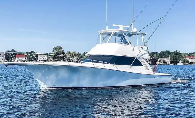 Kelly Lynn Yacht Photos Pics Henriques 50 Sportfisherman 2020 on calm water, blue sky.