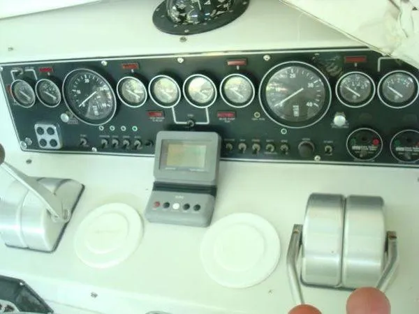  Yacht Photos Pics 1988 Chris-Craft Constellation dashboard with gauges and controls.
