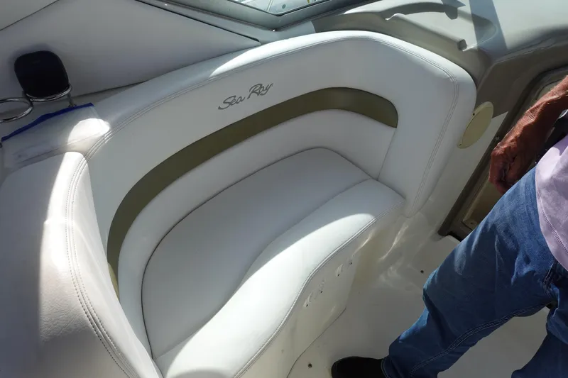  Yacht Photos Pics 2007 Sea Ray 320 Sundancer boat interior with white seating and logo.