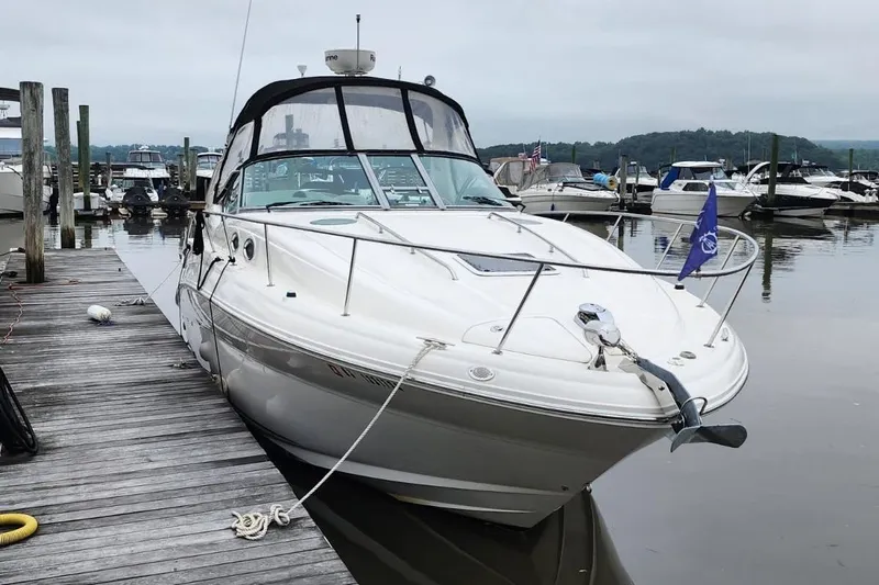 Yacht Photos Pics 2007 Sea Ray 320 Sundancer docked at marina, overcast sky, calm water.