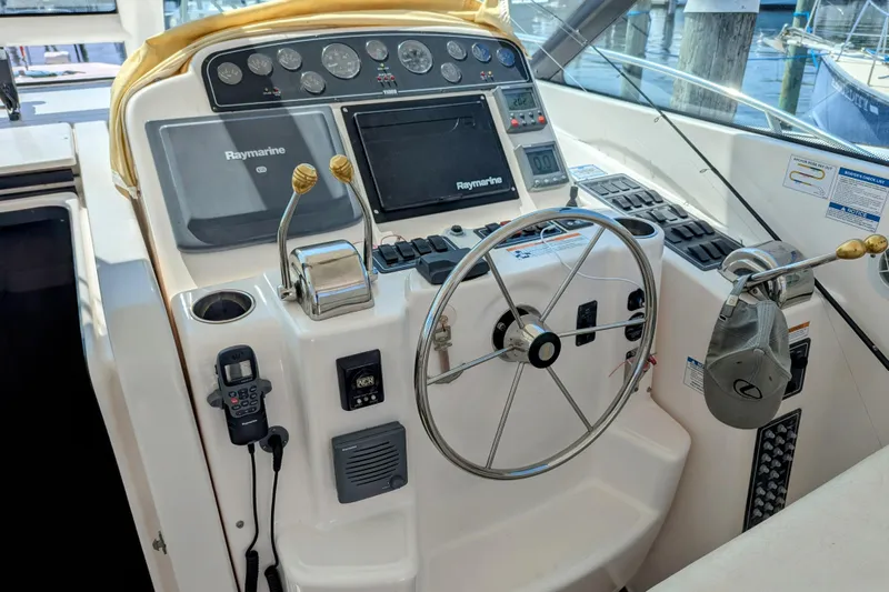  Yacht Photos Pics Helm of 2007 Tiara Yachts 3600 Sovran with Raymarine navigation system and steering wheel.
