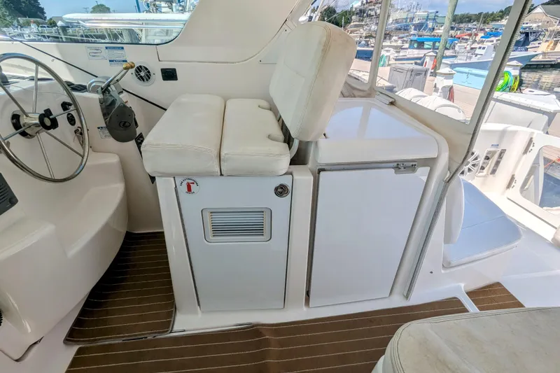  Yacht Photos Pics 2007 Tiara Yachts 3600 Sovran helm area with steering wheel and seating.