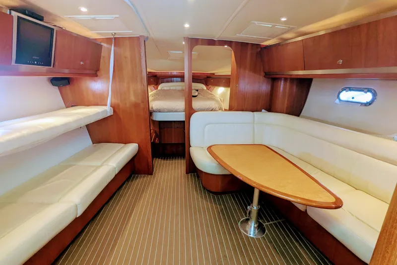  Yacht Photos Pics Luxurious interior of 2007 Tiara Yachts 3600 Sovran with elegant seating and wood finishes.
