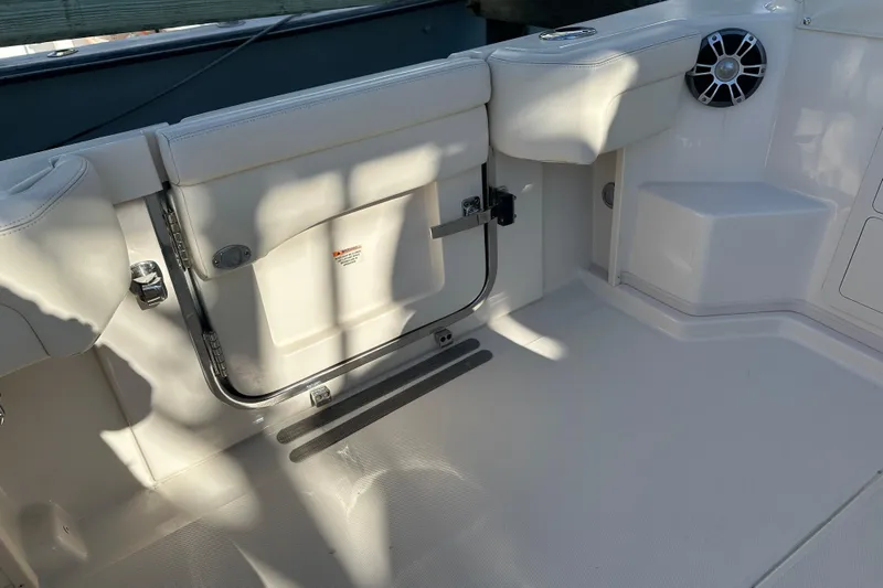  Yacht Photos Pics 2024 Grady-White Express 330 boat interior with seating and speaker detail.