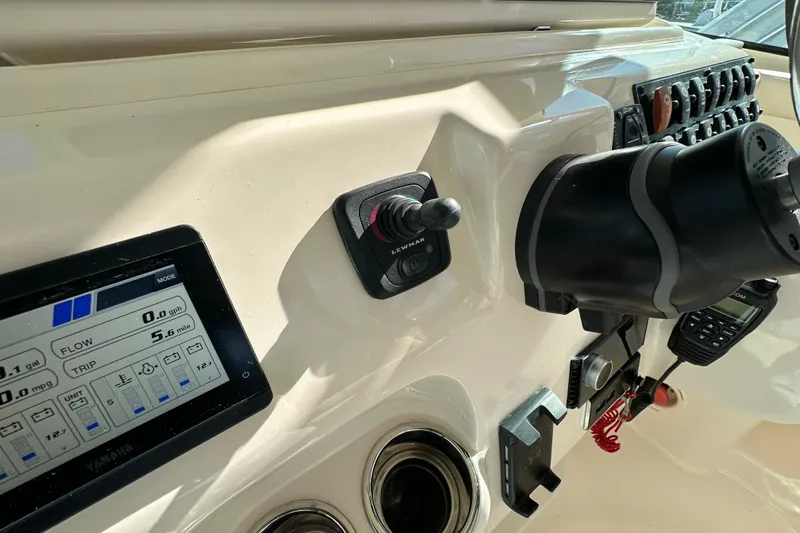  Yacht Photos Pics 2024 Grady-White Express 330 dashboard with controls and digital display.