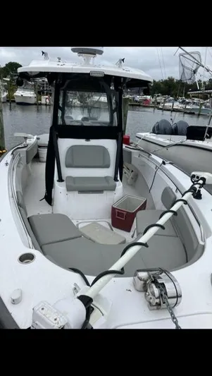  Yacht Photos Pics 2023 Cape Horn 27 XS boat with seating, docked in a marina.