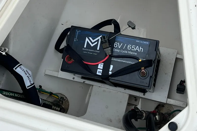Happy Hours Yacht Photos Pics Marine battery in 2023 Pursuit S 268 Sport boat, 6V 65Ah deep cycle, secured with straps.