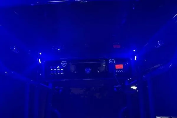  Yacht Photos Pics 1996 Formula 382 SR1 dashboard illuminated with blue LED lights at night.