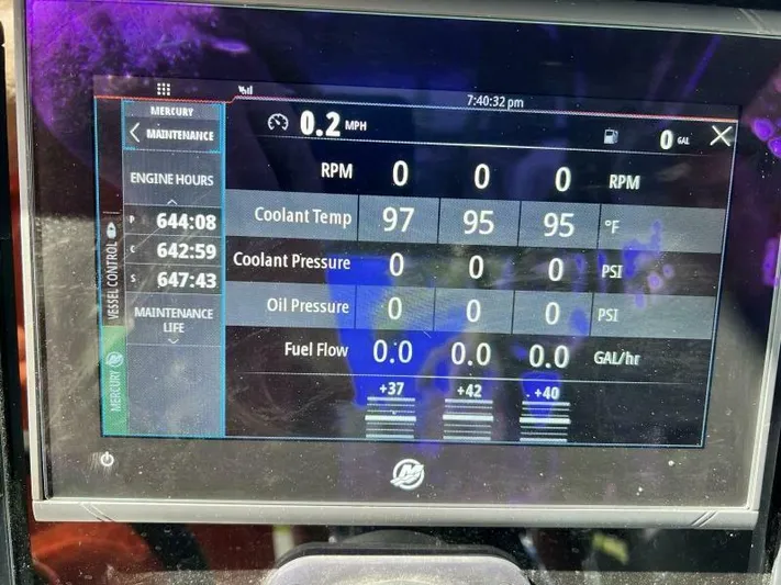  Yacht Photos Pics Dashboard of a 1996 Formula 382 SR1 showing engine metrics and maintenance data.