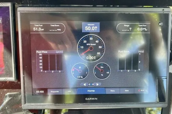  Yacht Photos Pics Garmin display showing fuel and speed data for 1996 Formula 382 SR1 boat.