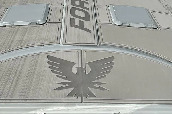  Yacht Photos Pics 1996 Formula 382 SR1 boat deck with eagle emblem and "FORMULA" text.