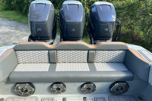  Yacht Photos Pics 1996 Formula 382 SR1 boat with triple outboard engines and cushioned seating.