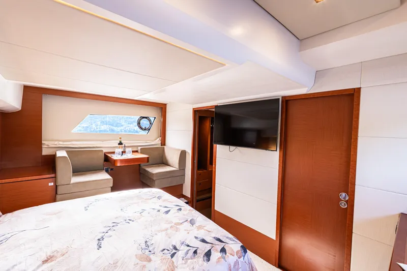 Luna Maris Yacht Photos Pics Luxurious interior of 2016 Prestige 550 Flybridge yacht with elegant seating and modern amenities.