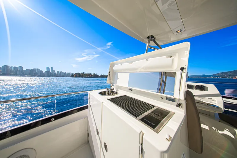 Luna Maris Yacht Photos Pics Luxurious 2016 Prestige 550 Flybridge yacht with stunning city skyline and ocean view.