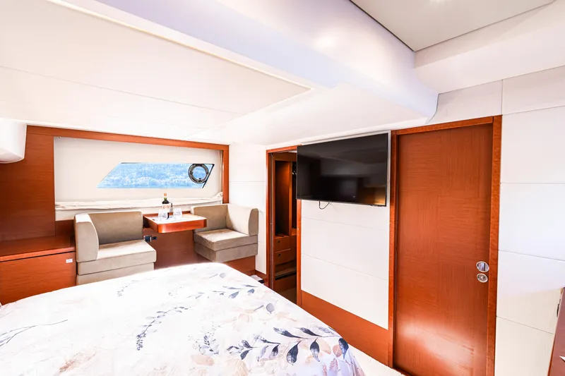 Luna Maris Yacht Photos Pics Luxurious interior of a 2016 Prestige 550 yacht with elegant seating and modern amenities.