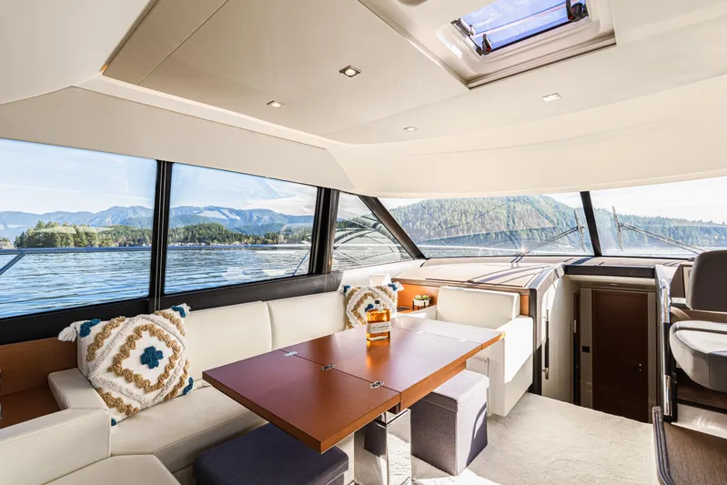 Luna Maris Yacht Photos Pics Luxurious interior of 2016 Prestige 550 yacht with scenic water views.